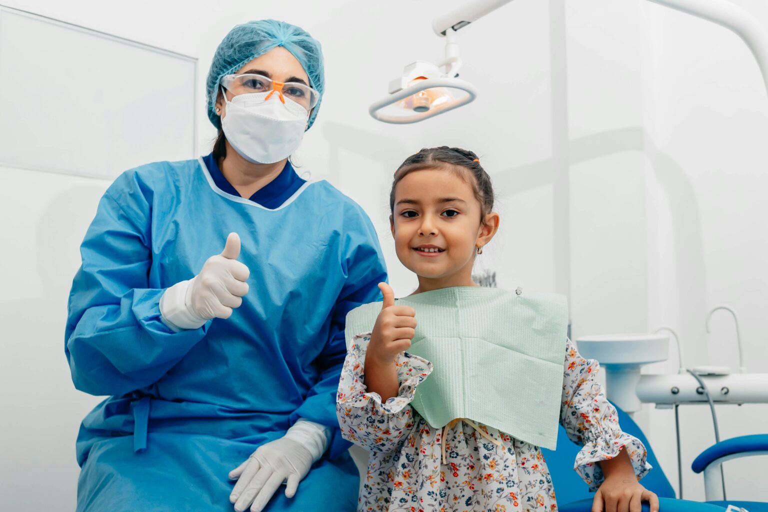 Dentist with Happy child patient | Bloor Smile Dental | Bloor West Village, Toronto